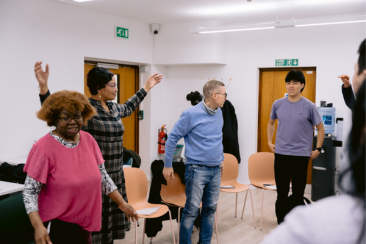Residents taking part in a group activity at an adult learning class
