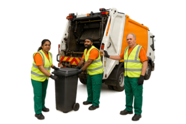 Waste collection workers standing beside a refuse lorry and wheelie bin