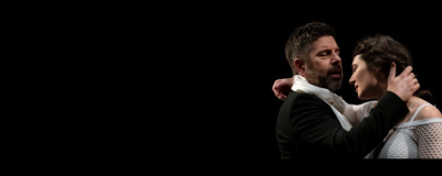 A man and a woman holding each other