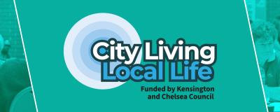 A group of people sat around tables discussing things.