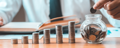 a person counting coins