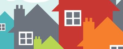 A series of cartoon houses in different colours.