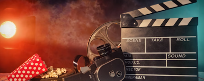 Cinematic equipment including a video camera and a clapper board