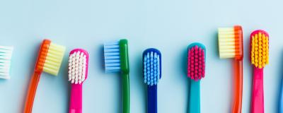 different coloured toothbrushes