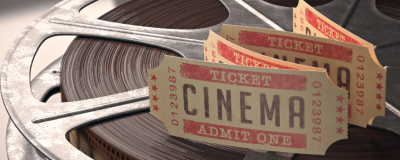 Cinema tickets on a reel of film