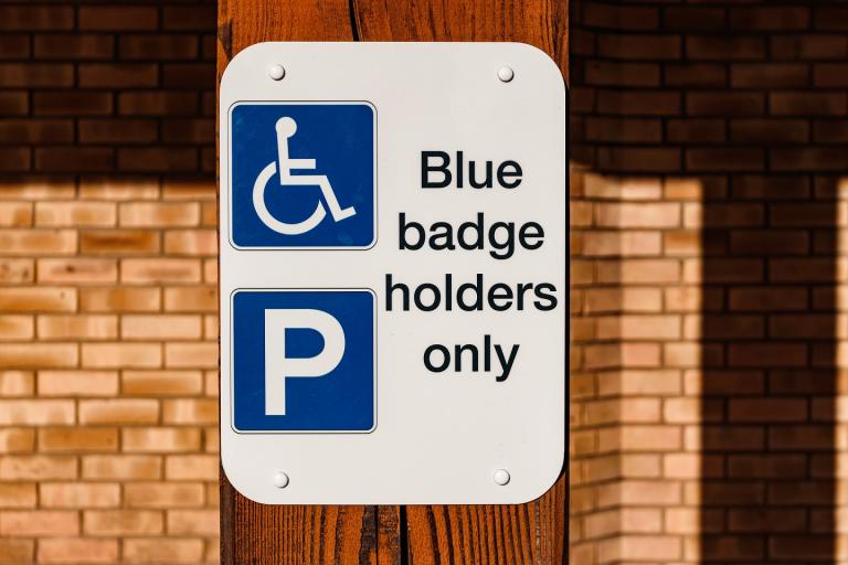 Blue badge parking sign