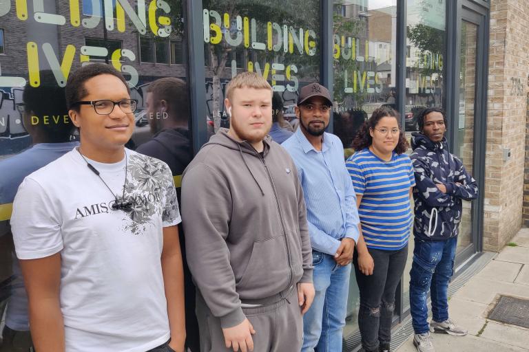 Graduates celebrate completing the Building Lives Academy