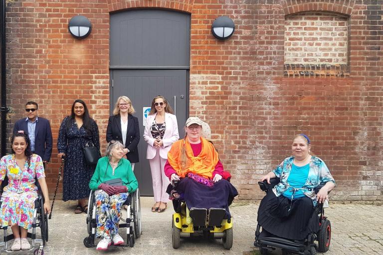 Group of people outside the Changing Places toilet in Holland Park