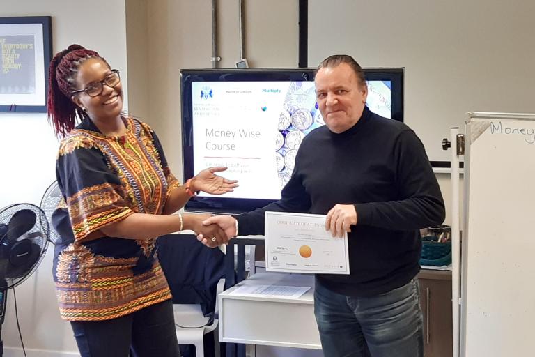 a learner receives a certificate from the tutor