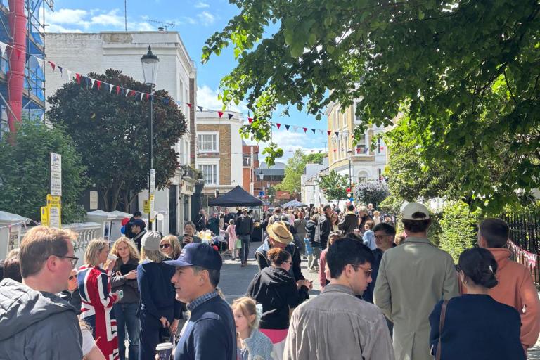 An image showing people celebrating VE Day in Holland Street