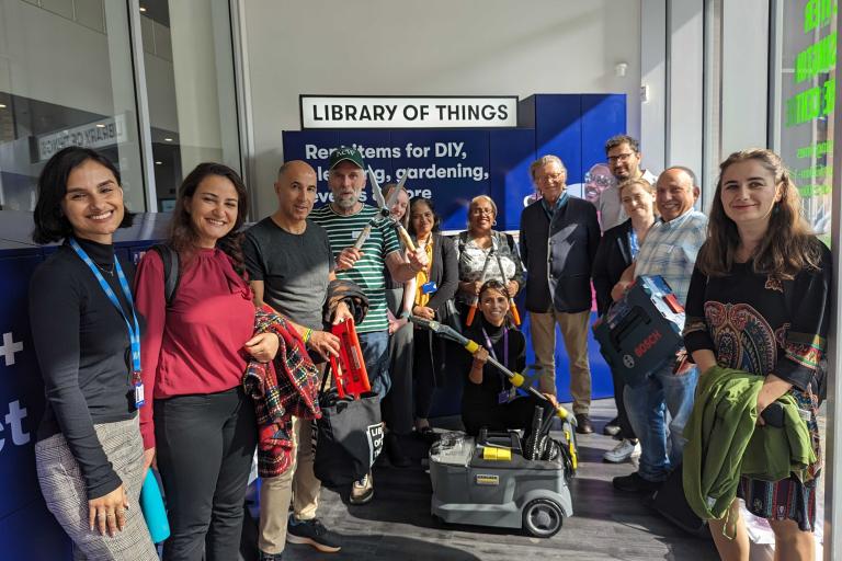 Group of community members and officers at the new Library of Things at Kensington Leisure Centre