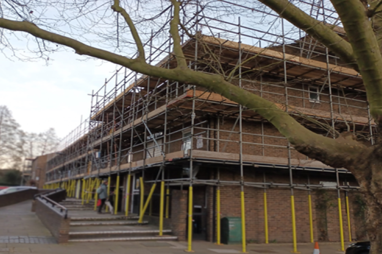 An image of a building on Notting Barn Estate which has scaffolding