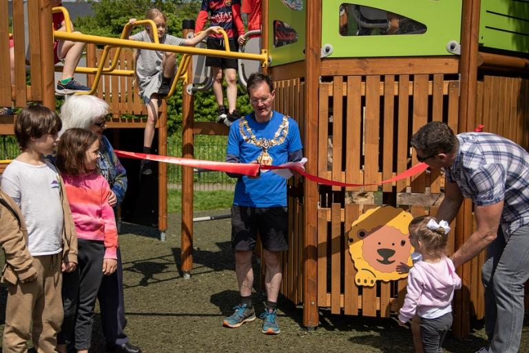 Mayor cuts ribbon opening new playground at Avondale Park