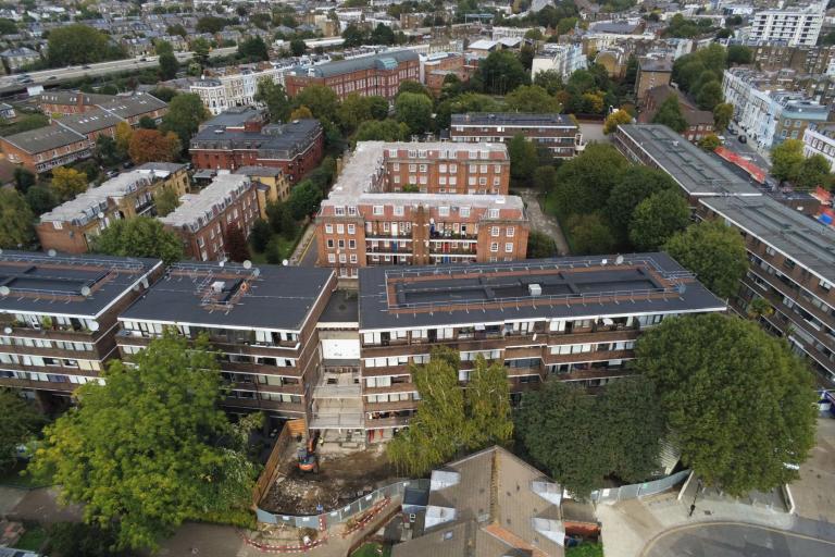 An aerial view of Notting Dale Ward in North Kensington, taken by a drone, showing houses and other buildings, from above.