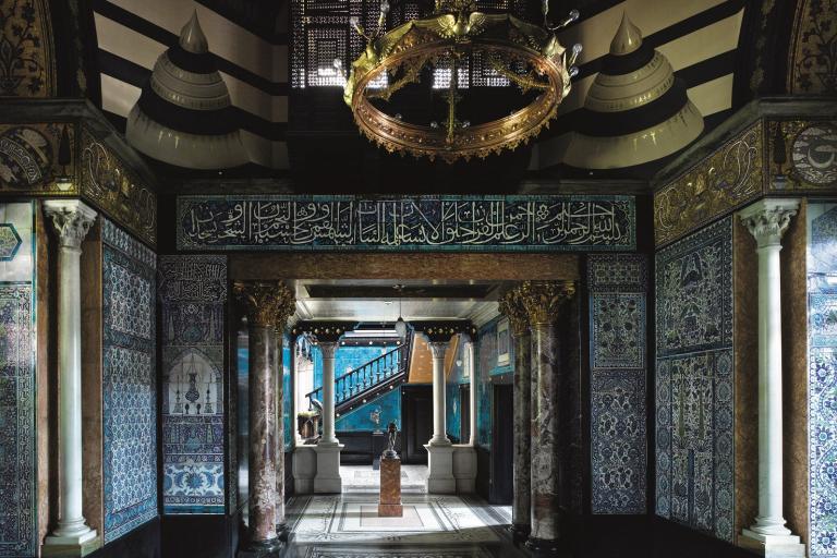 A blue tiled room in the style of a Middle Eastern set of rooms at Leighton House