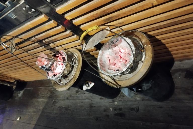 Shisha hanged on wooden fencing
