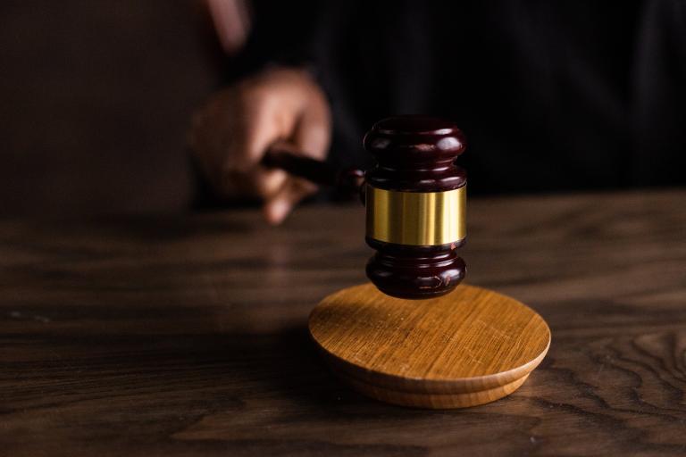 a judge strikes a gavel