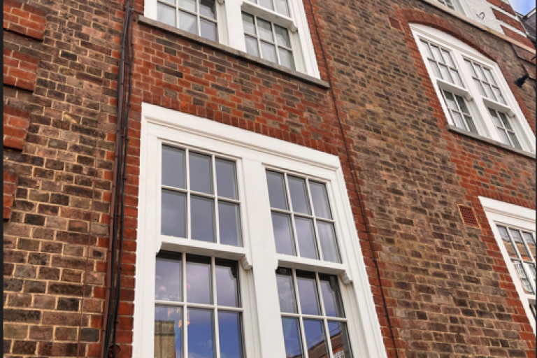 red brick building with new refurbished windows