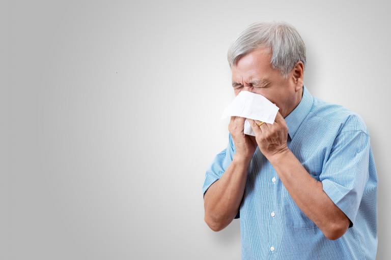sneezing man for newsroom.jpg sneezing man for newsroom.jpg