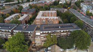 An aerial view of Notting Dale Ward in North Kensington, taken by a drone, showing houses and other buildings, from above.