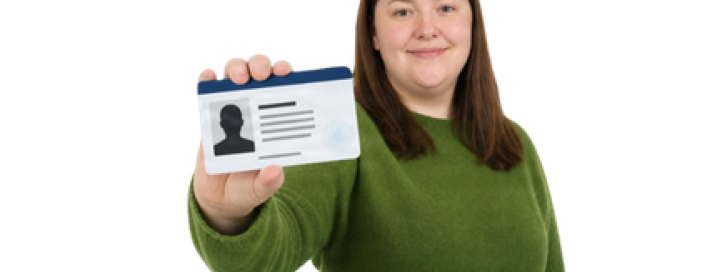 Person holding an identification card