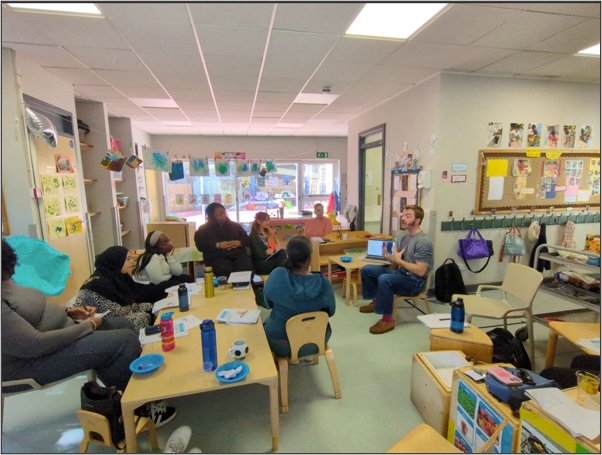 People sat in a room and talking