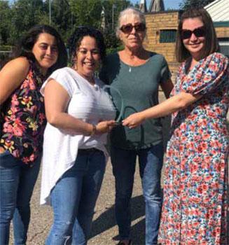 Four ladies porudly holding their Nanny 2020 award