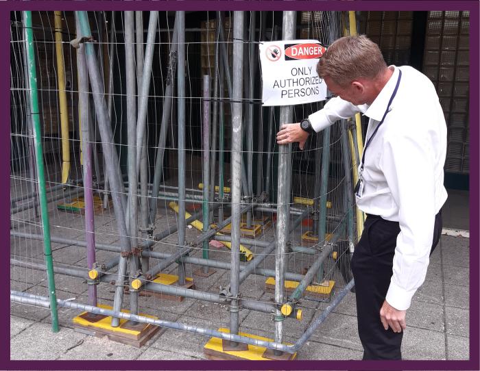 Building Safety Inspector assessing Scaffolding