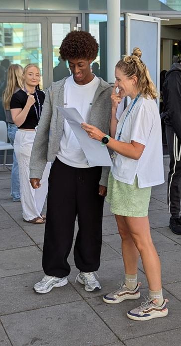 Students receive their GCSE results at KAA