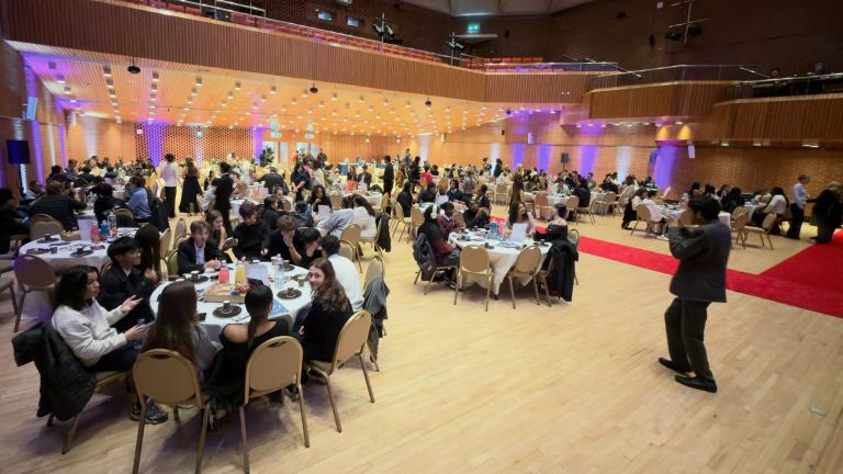 Young people and youth workers wait for the young leaders awards to begin