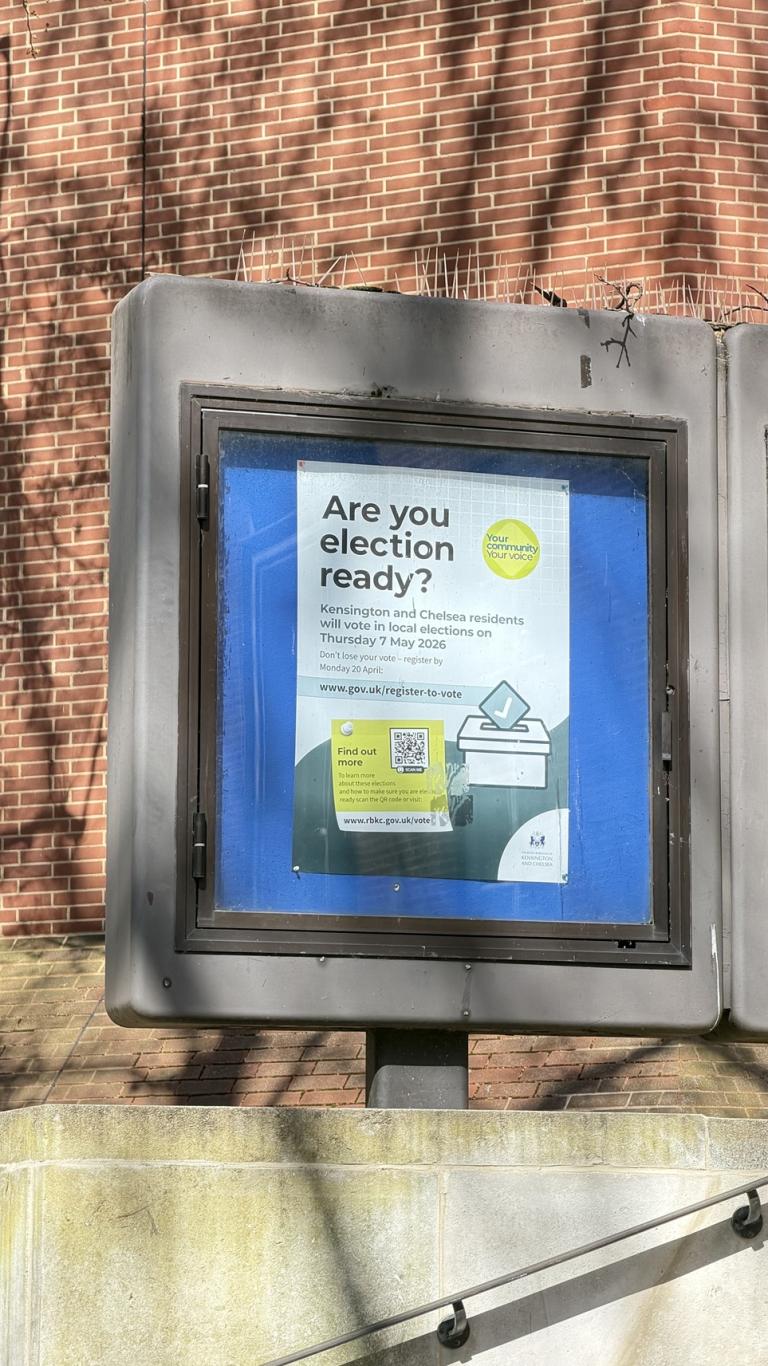 A poster board in Jubilee Square with elections guidance and reminders