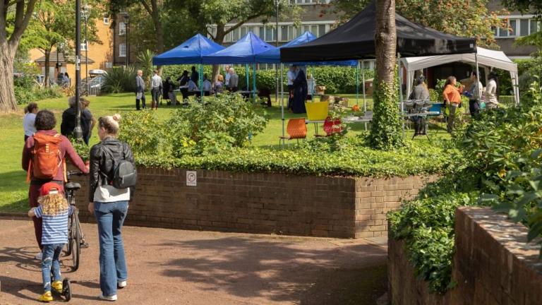 People enjoy a green space 