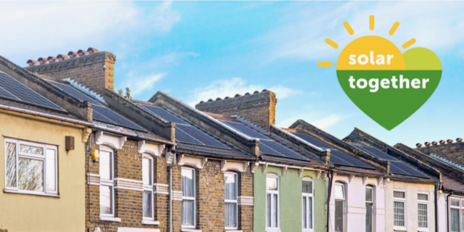 Row of terraced houses with solar panels