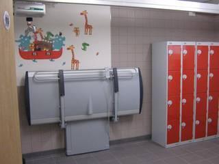 A locker room with a baby-changing station and a picture of Noah's Ark