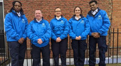 Five members of the street enforcement team side by side in blue uniform