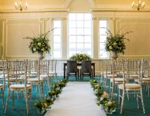 Room with chairs set up for ceremony