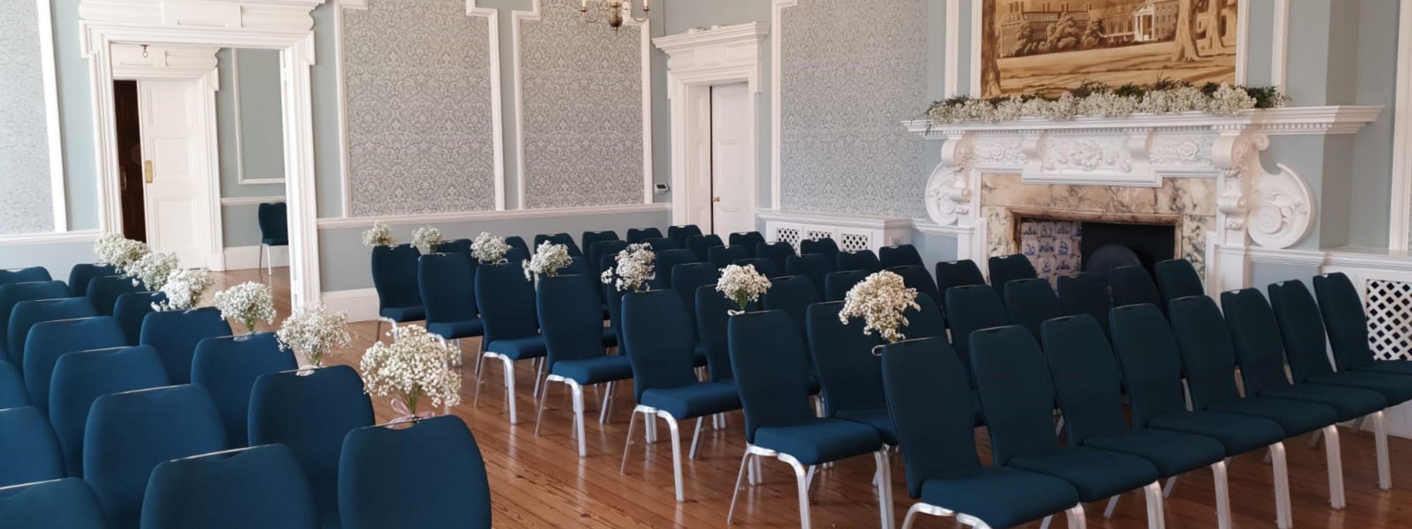 Cadogan suite ceremony layout blue chairs