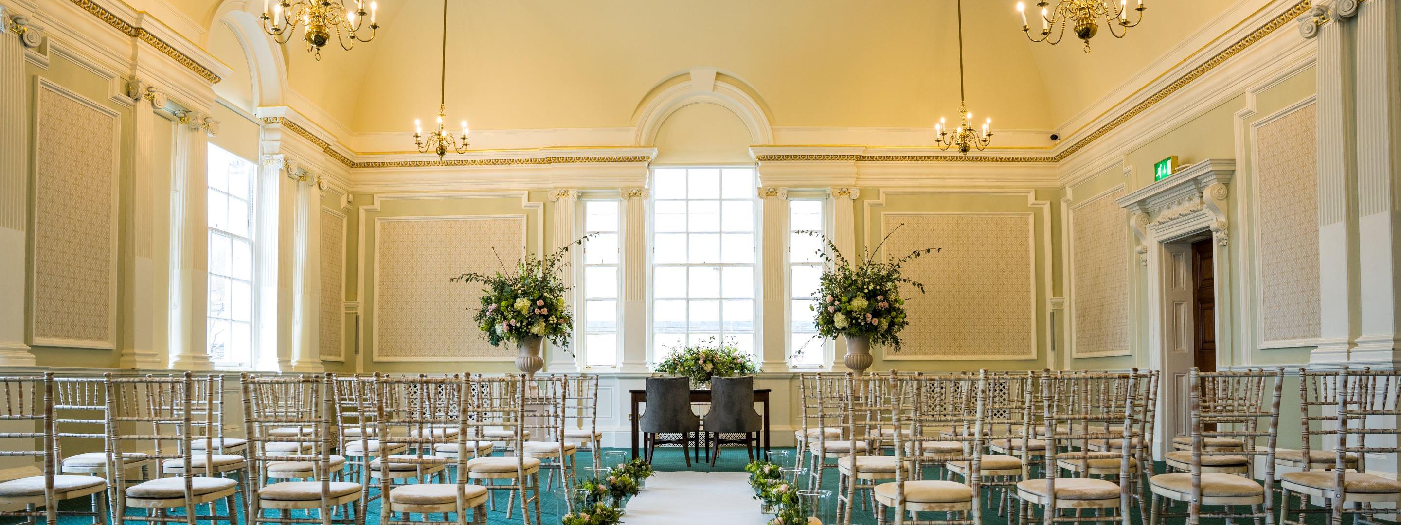 Room with chairs set up for ceremony