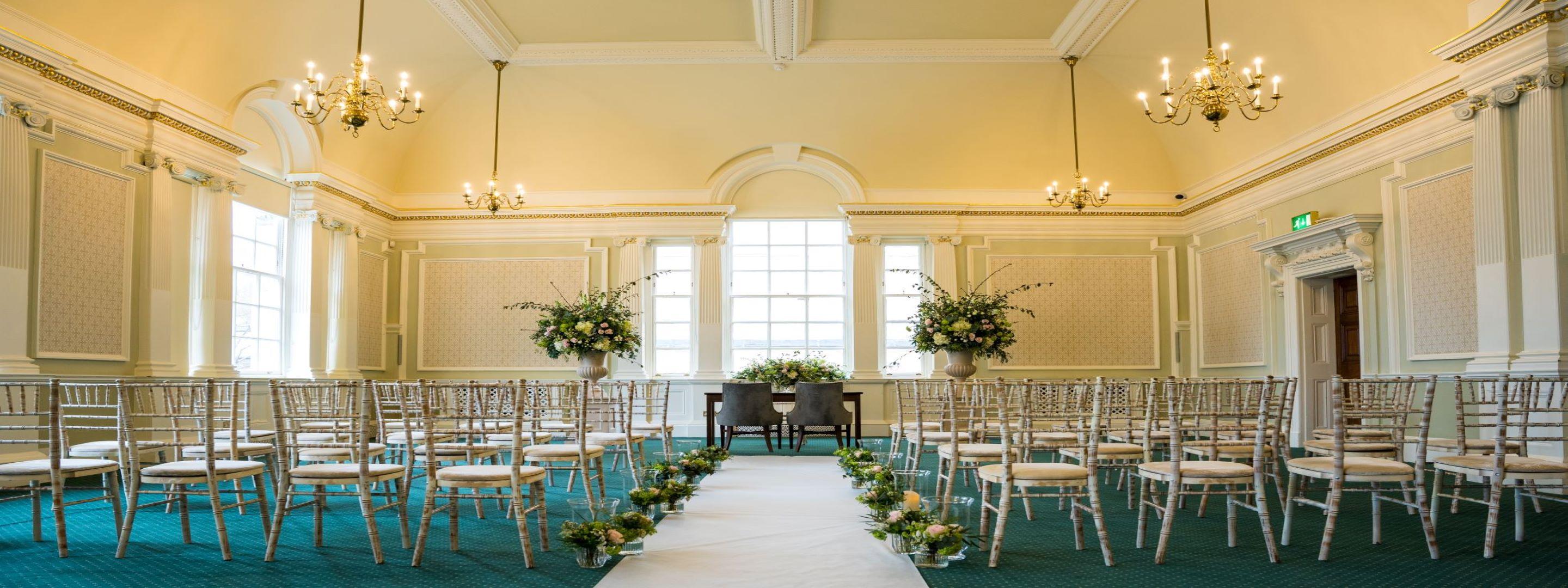 Room with chairs set up for ceremony