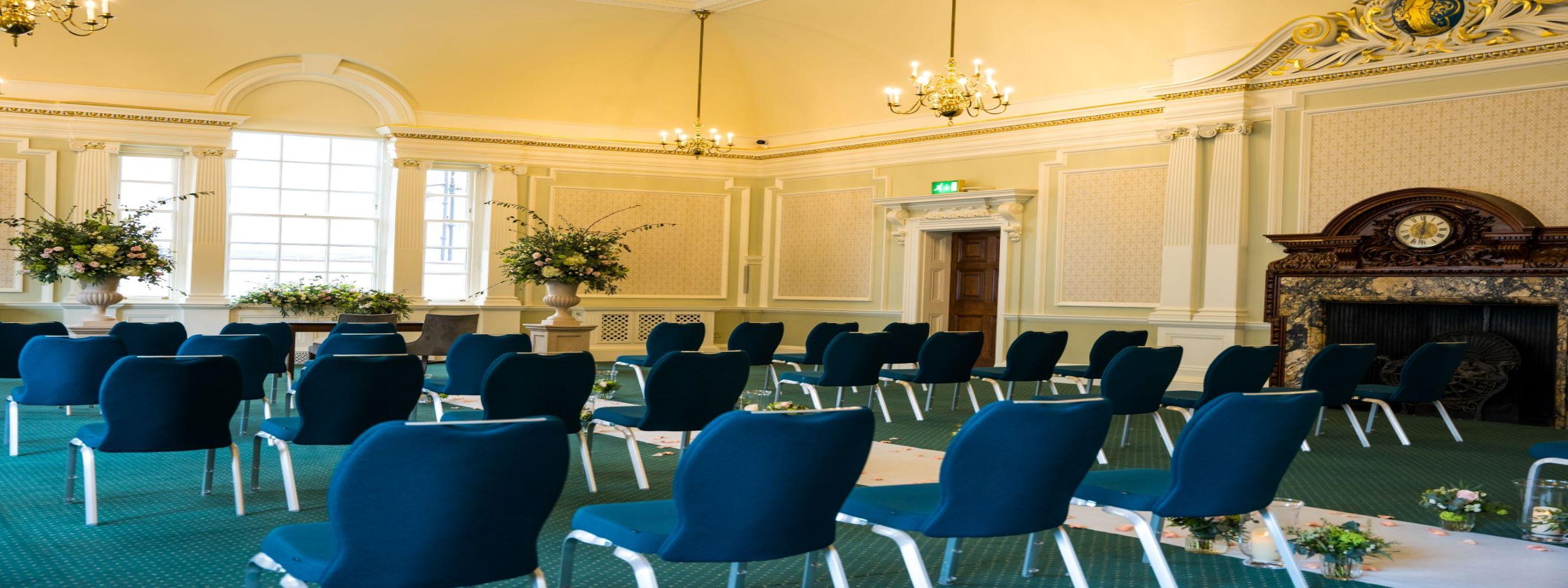 Room with chairs set up for ceremony
