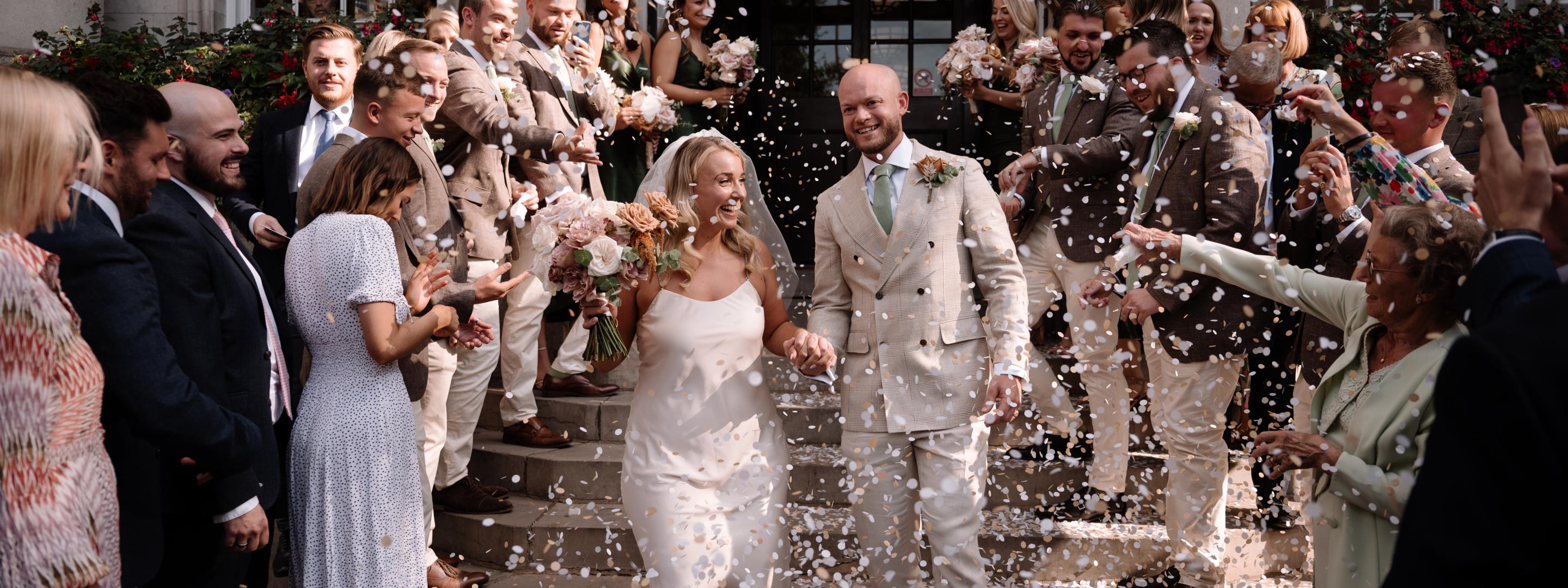 Wedding party outside venue