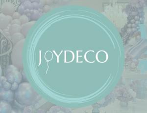 JoyDeco logo on a background of party balloons