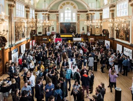 Exhibition room full of people