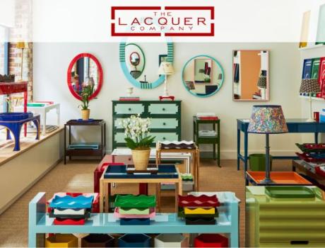 Room of displays of ornaments and furnishings on freestanding shelves and mirrors and pictures on the walls.