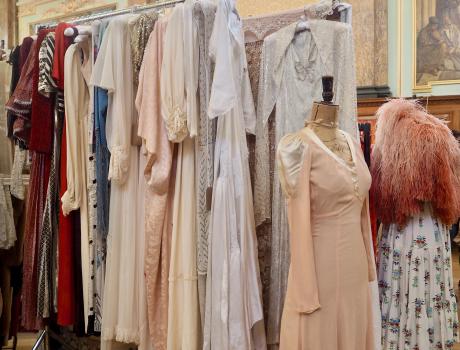 A photo of vintage frocks, dresses and other clothes